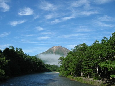 Yakedake Surrounded by Blue Sky and Slight Traces of Clouds